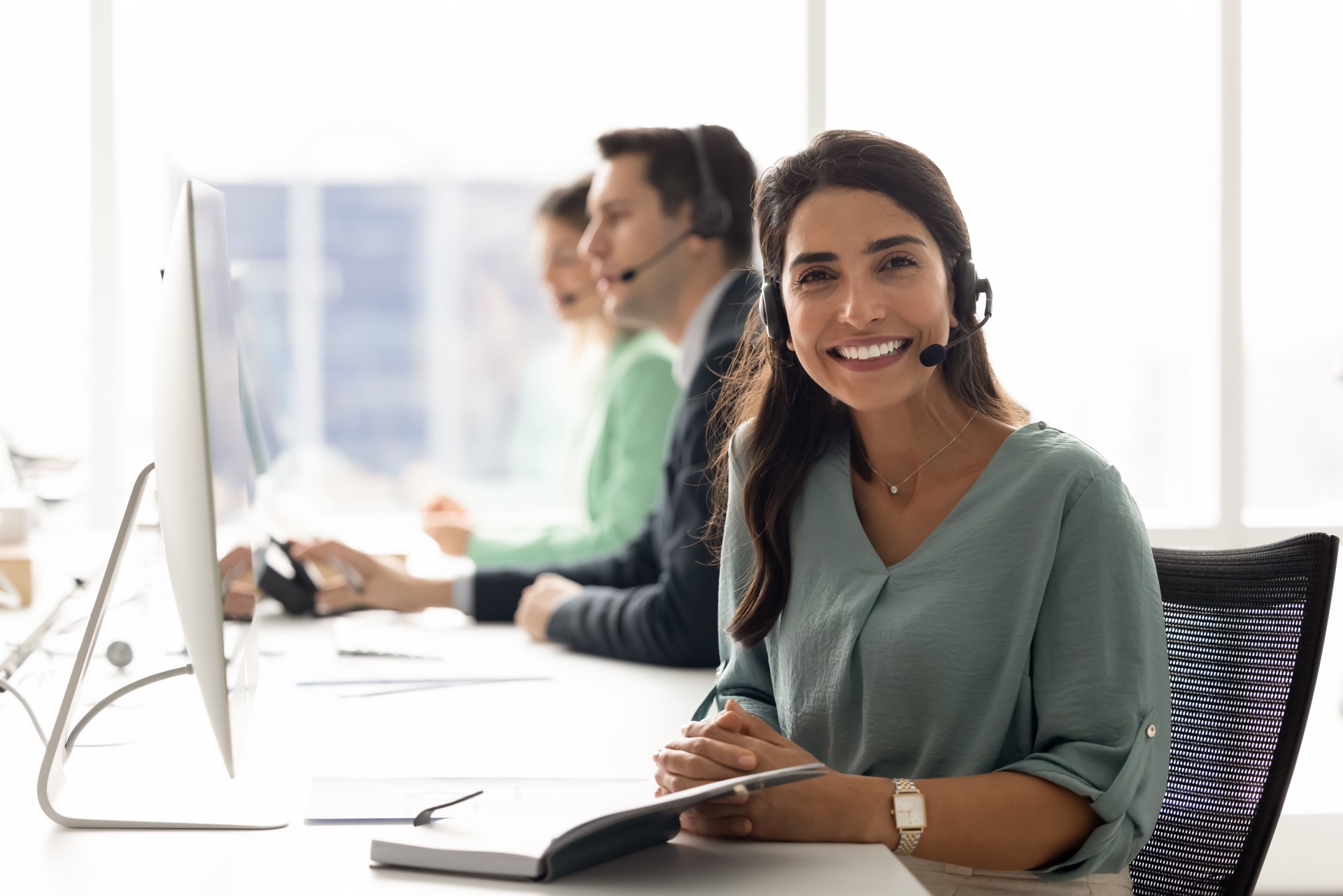 Portrait of young customer service representative, call center agent